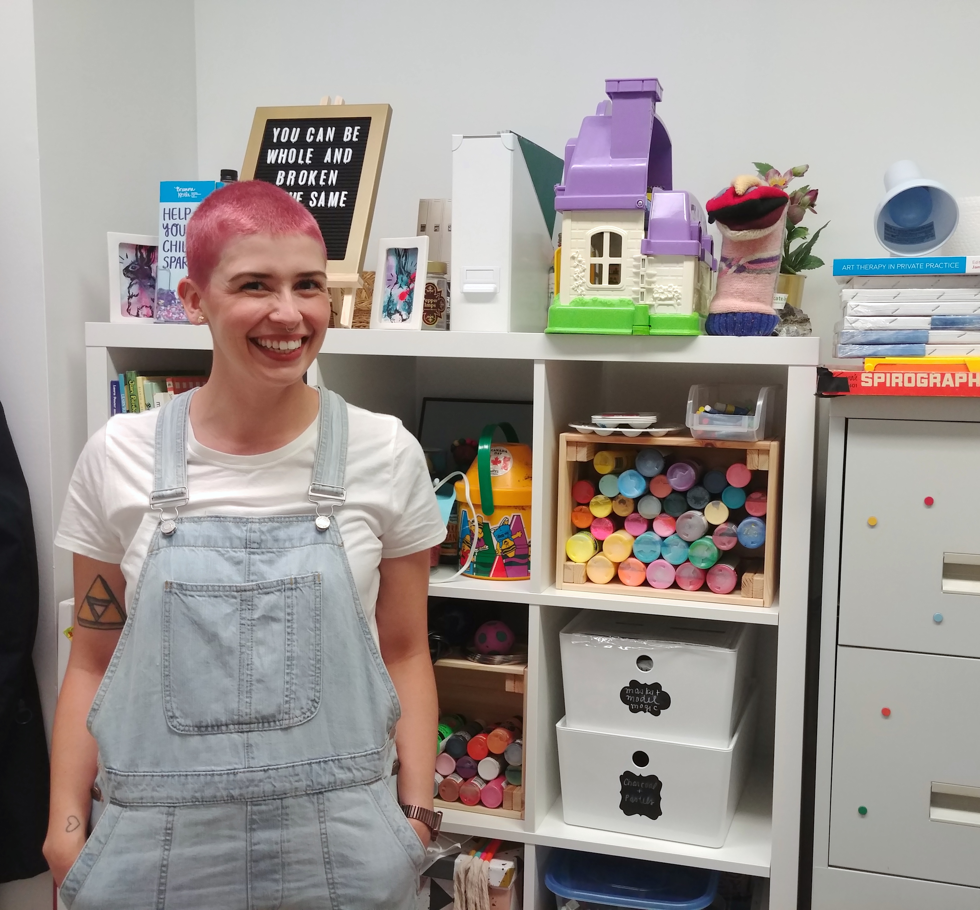 Brianna With her art supplies in office